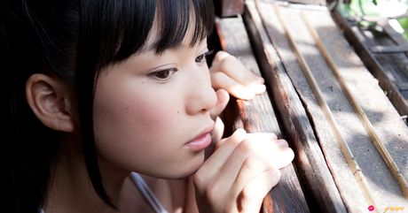 Asian babe Tomoe Yamanaka exhibits her nice tits and poses in a solo