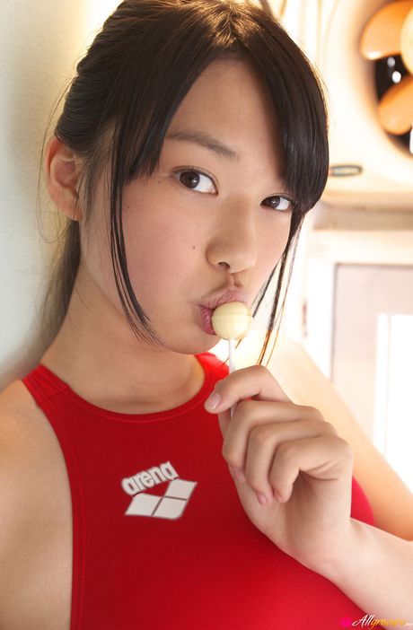 Asian cutie Tomoe Yamanaka removes her swimsuit and poses in white stockings