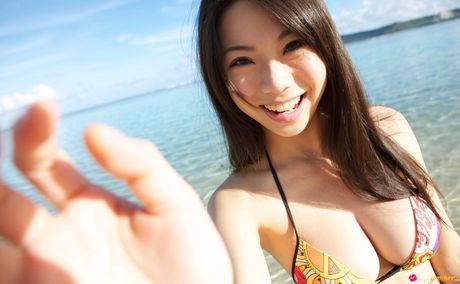 Asian covergirl Fumina Suzuki takes off her bikini in a secluded area