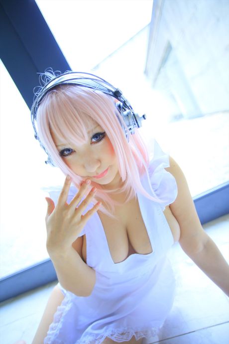 Big-Breasted japanese teen Saku strips her pink lingerie and shows her big juggs