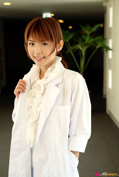 Asian cutie Aya Nakata removes her dress and presents her sexy ass