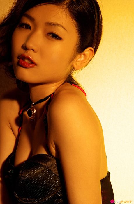 Asian babe Noriko Kijima reveals her small tits and poses in a solo