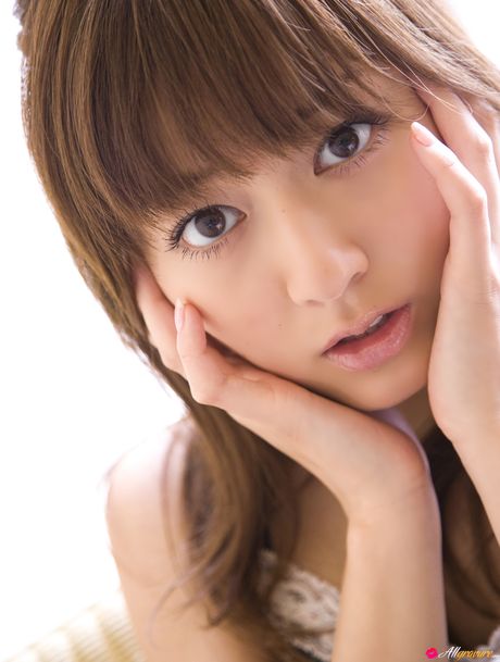 Asian model Yumi Sugimoto smokes a cigarette before getting naked