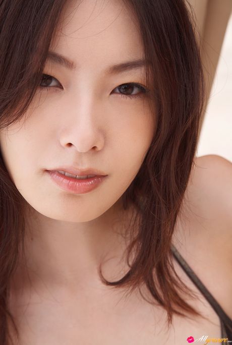 Perfect Asian teen Nao Nagasawa displays her amazing racks and poses in a solo