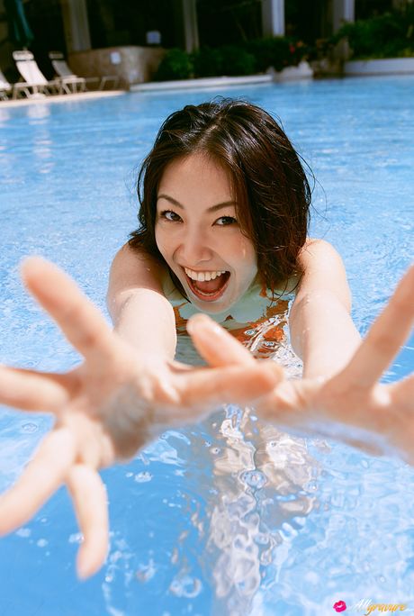 Perfect Asian teen Nao Nagasawa displays her amazing racks and poses in a solo