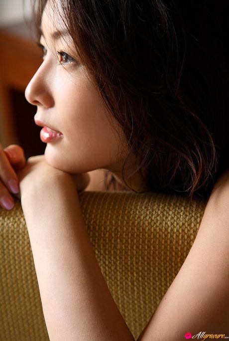 Perfect Asian teen Nao Nagasawa displays her amazing racks and poses in a solo