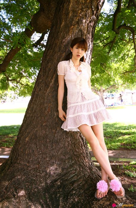 Striking Asian teen Aki Hoshino flaunts her big tits and poses in a bikini