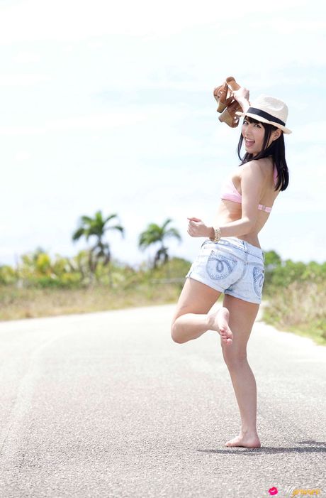 Asian babe Yume Kana gets naked in a hat and a pair of pink panties