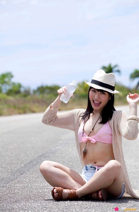 Asian babe Yume Kana gets naked in a hat and a pair of pink panties