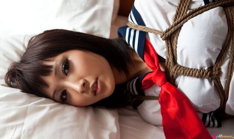 Asian schoolgirl Shiryl gets tied up in a chair and fisted