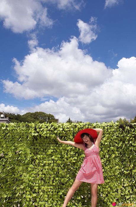 Asian stunner Ayana Tanigaki highlights her nice tits and poses in a hat