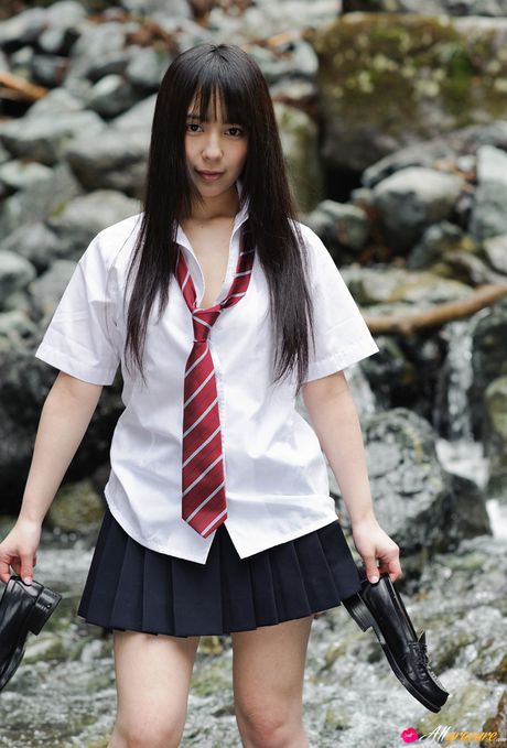 Asian cutie Ruka Kanae exposes her small tits and poses in a solo