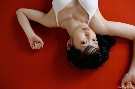 Asian doll Airi Suzuki removes her bikini before taking a bath