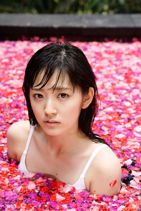 Asian doll Airi Suzuki removes her bikini before taking a bath