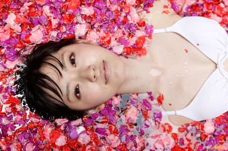 Asian doll Airi Suzuki removes her bikini before taking a bath