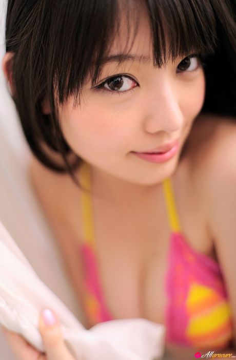 Asian stunner Haruka Ando uncovers her firm tits before showing her ass