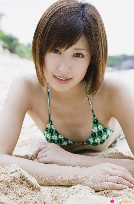 Brown-Eyed japanese beauty Marica Minami exhibits her small tits and hot ass in a bikini