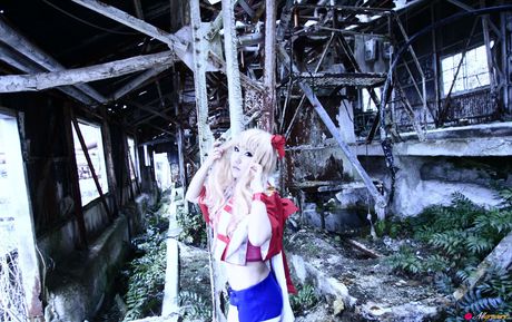 Blond japanese covergirl Saku reveals her nice tits and poses in a red dress