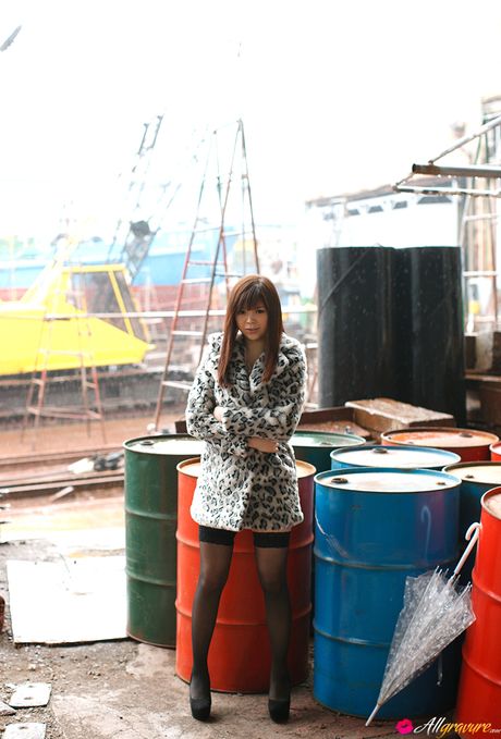 Asian covergirl Rina Itoh flaunts her big boobs and poses in a solo