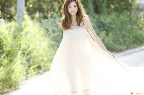 Fantastic Asian teen Aki Hoshino displays her hot body in a solo striptease