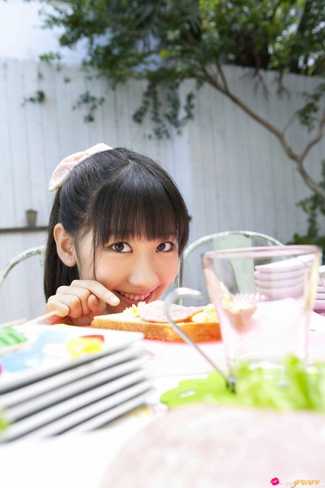 Bikini model Yuki Kashiwagi reveals her perfect ass in the garden