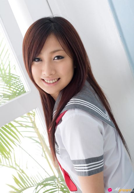 She also strips down to her socks and poses in a sexy way