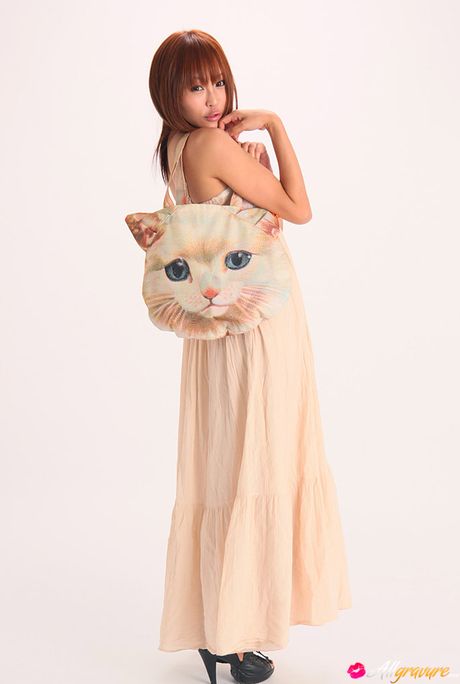 Fantastic Asian babe Sayuri Ono presents her petite tiny tits and her bald pussy