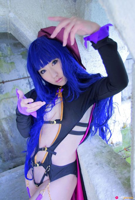 Asian stunner Saku shows her large boobs and poses in a solo