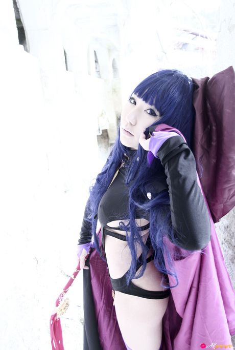 Asian stunner Saku shows her large boobs and poses in a solo