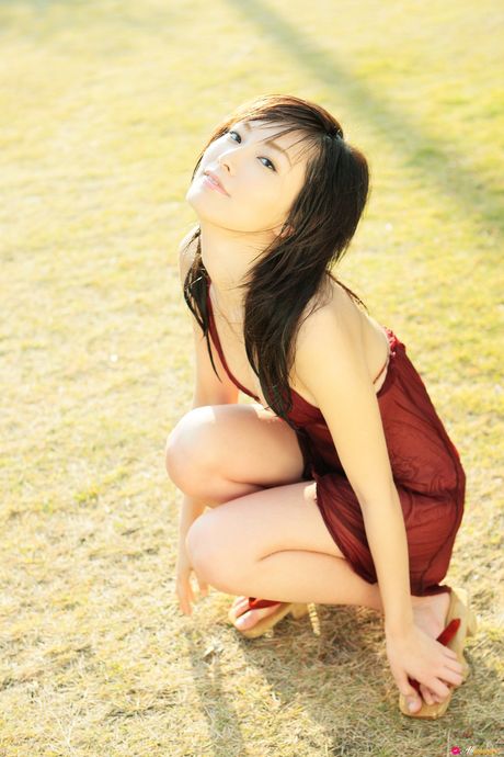 Ravishing Asian teen Nao Nagasawa reveals her big juggs and exhibits her nudity outdoors