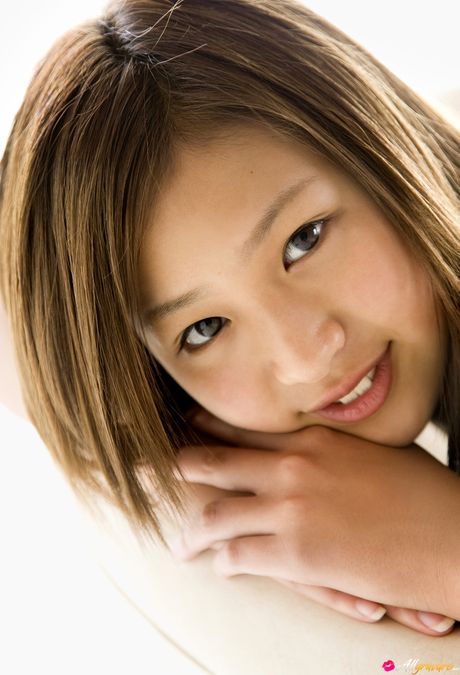 Asian beauty Ayaka Sayama removes her bikini and flaunts her tits and ass