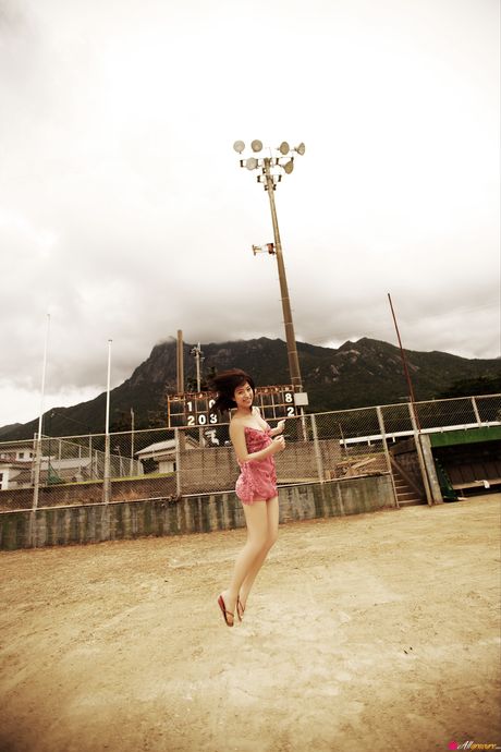 Asian teen Kasumi Nakane displays her natural small tits and disrobes for the camera in nature