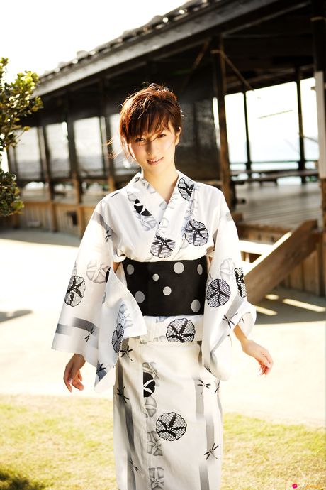 Asian teen Kasumi Nakane displays her natural small tits and disrobes for the camera in nature