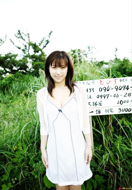 Asian teen Kasumi Nakane displays her natural small tits and disrobes for the camera in nature