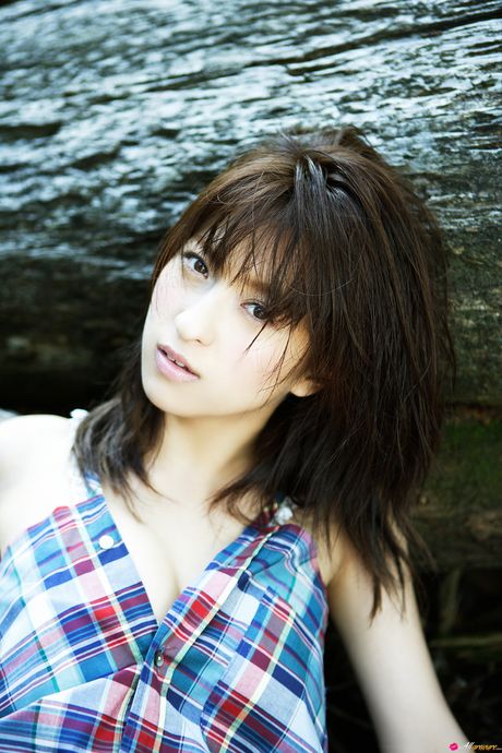 Asian teen Kasumi Nakane displays her natural small tits and disrobes for the camera in nature