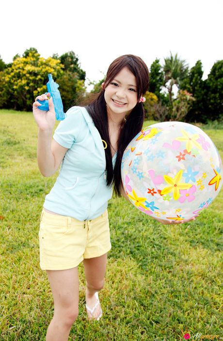 Asian stunner Kana Tsuruta gets naked in a sexy manner on a blanket