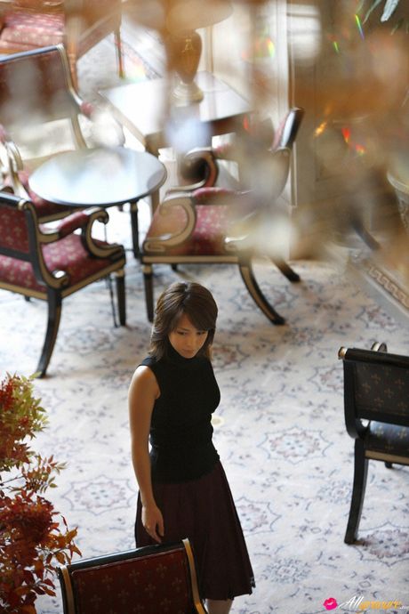 Asian girl Misato Kashiwagi flaunts her flat tits and poses in a solo