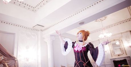 Asian stunner Saku wears a black dress before getting naked on a sofa