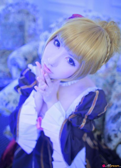 Asian stunner Saku wears a black dress before getting naked on a sofa