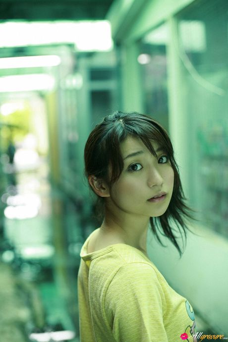 Asian girl Yuko Oshima flaunts her flat tits and poses in stockings