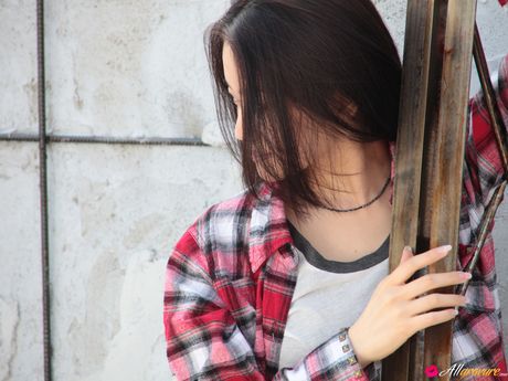 Asian babe Manami Yamaguchi displays her large boobs and poses in a solo