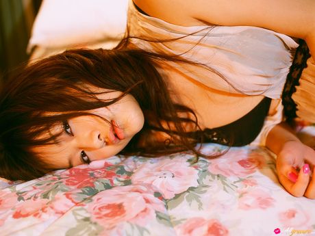 Asian doll Risa Kudo takes off her bikini before getting in a bathtub