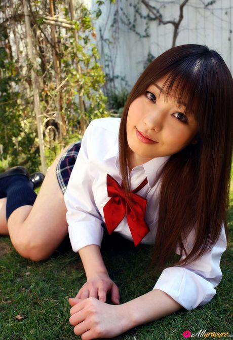 Asian teen Kei Suzukawa displays her tiny tits and poses in a solo