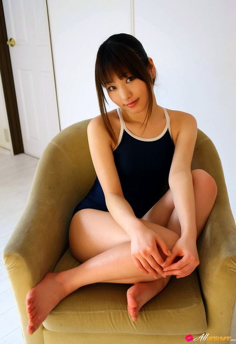 Asian teen Kei Suzukawa displays her tiny tits and poses in a solo