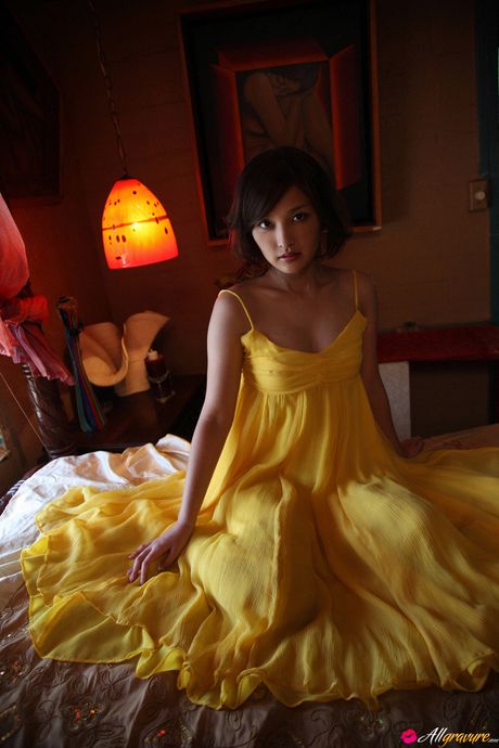 Asian teen Rika Ishikawa gets naked in a cowboy hat and boots