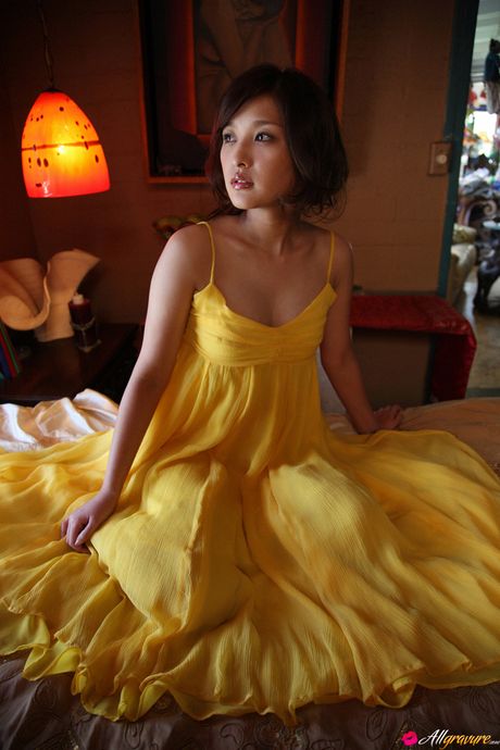 Asian teen Rika Ishikawa gets naked in a cowboy hat and boots