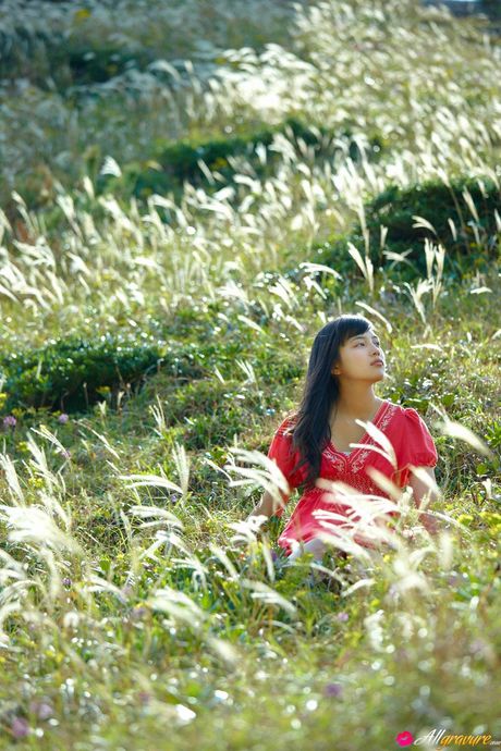 Asian cutie Haruna Kawaguchi exhibits her amazing juggs and poses in a solo