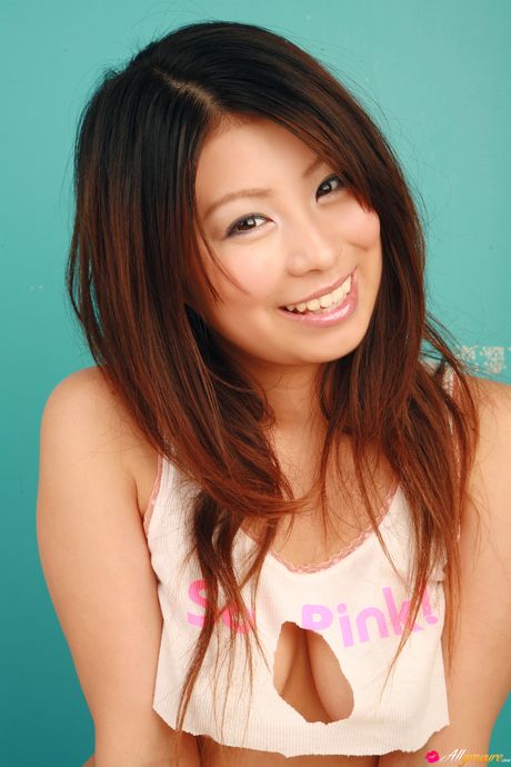 Asian cutie Mimi Kousaka exposes her amazing juggs and shows off her undraped figure in a solo