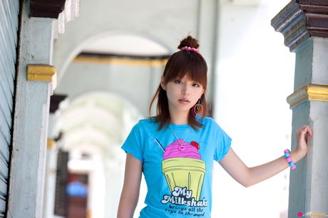 Asian girl Aya Hirano exposes her small tits and exhibits her nudity outdoors