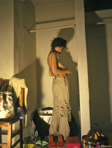 Asian girl Aki Hoshino gets naked on a kitchen counter